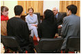 Mrs. Laura Bush is joined by Afghan Foreign Minister Rangeen Dadfar Spanta, center right, for a meeting with Afghan teachers and students, Sunday, June 8, 2008, during an unannounced visit to Kabul. Attending the meeting were representatives from Kabul University, American University of Afghanistan, International School of Kabul and the Women's Teacher Training Institute.