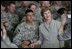 Mrs. Laura Bush poses for a photo with a US soldier during her visit to Bagram Air Force Base Sunday, June 8, 2008, in Bagram, Afghanistan.