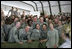 Mrs. Laura Bush poses for a photo with US troops during her visit to Bagram Air Force Base Sunday, June 8, 2008, in Bagram, Afghanistan.