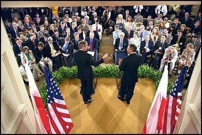 The two Presidents conduct a joint press conference in the East Room July 17. The leaders outlined two initiatives that would encourage stronger military and economic cooperation between Poland and the United States.