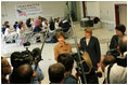 Laura Bush and U.S. Secretary of Education Margaret Spellings talk with reporters following their visit with staff and students Wednesday, Jan. 26, 2006 at the St. Bernard Unified School in Chalmette, La. The school is rebuilding after being ravaged in Hurricane Katrina.