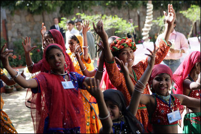 Dancers perform for Mrs. Laura Bush during her tour of Prayas, Thursday, March 2, 2006, in New Delhi, India.