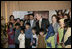 President George W. Bush and Pakistan President Perez Musharraf with Laura Bush and Mrs. Sehba Musharraf appear together Saturday, March 4, 2006 in Islamabad at a briefing to update the reconstruction and aid efforts for earthquake victims in regions of Pakistan.