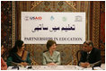 Mrs. Laura Bush addresses a roundtable discussion during an Education Through Partnerships meeting with representatives from USAID, UNESCO & CRI at library at the U.S. Embassy, Saturday, March 4, 2006 in Islamabad, Pakistan.