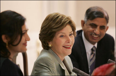 Mrs. Laura Bush addresses a roundtable discussion during an Education Through Partnerships meeting with representatives from USAID, UNESCO & CRI at library at the U.S. Embassy, Saturday, March 4, 2006 in Islamabad, Pakistan.