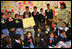 Mrs. Laura Bush reads to children at the Children's Resources International clasroom at the U.S. Embassy, Saturday, March 4, 2006 in Islamabad, Pakistan.