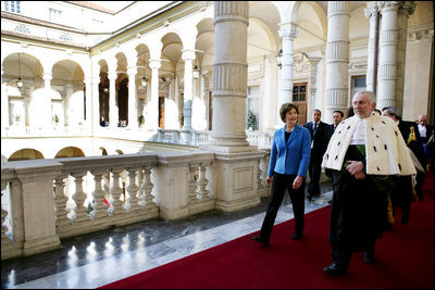 Laura Bush is guided on a tour of the Ancient Library at the University of Turin by Enrico Artifoni, Library President Saturday, Feb. 11, 2006, in Turin, Italy.