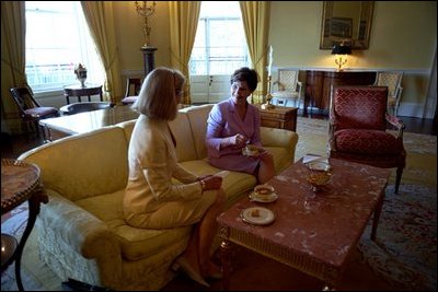 Nane Annan, wife of United Nations Secretary-General, joins Laura Bush for coffee in the Yellow Oval Room Friday, May 11, 2001. White House photo by Paul Morse.