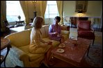 Nane Annan, wife of United Nations Secretary-General, joins Laura Bush for coffee in the Yellow Oval Room Friday, May 11, 2001. White House photo by Paul Morse.