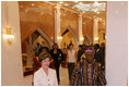 Laura Bush walks with Nigerian President Olusegun Obasanjo at the conclusion of their meeting at the presidential villa in Abuja, Nigeria, Wednesday, Jan. 18, 2006.