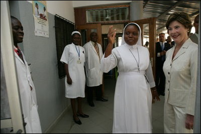 Laura Bush is given a tour of St. Mary's Hospital by Sister Elizabeth Obasi in Gwagwalada, Nigeria, Wednesday, Jan. 18, 2006.