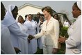 Laura Bush is greeted at Saint-Mary's Catholic Hospital in Gwagwalada, Nigeria Wednesday, Jan. 18, 2006.