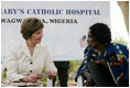 Laura Bush meets with a patient at St. Mary's Hospital in Gwagwalada, Nigeria, Wednesday, Jan. 18, 2006.