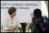 Laura Bush meets with a patient at St. Mary's Hospital in Gwagwalada, Nigeria, Wednesday, Jan. 18, 2006.