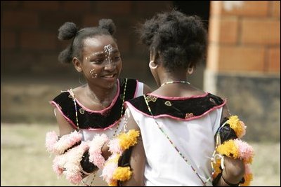 Young girls perform a dance routine at the Model Secondary School during a visit to the school by Laura Bush in Abuja, Nigeria Wednesday, Jan. 18, 2006.