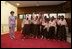 Laura Bush is greeted by a children's singing group at the National Center for Women's Development in Abuja, Nigeria, Wednesday, Jan. 18, 2006.