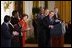 President George W. Bush acknowledges school principals and superintendents, education leaders, and Members of Congress in celebrating the one-year anniversary of the signing of the No Child Left Behind Act in the East Room, Wednesday, Jan. 8, 2003. White House photo by Tina Hager