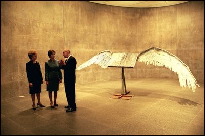 Laura Bush stops in front of the sculpture, "Book with Wings" by Anselm Kiefer during a tour of the Modern Art Museum of Fort Worth, Texas, Thursday, Feb. 20, 2003. "Touring the Modern is an experience in art itself," Mrs. Bush said. "You feel part of the paintings as you walk through the perfectly lit galleries. Art just doesn't just hang in the Modern, it comes to life." White House photo by Susan Sterner.