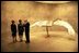 Laura Bush stops in front of the sculpture, "Book with Wings" by Anselm Kiefer during a tour of the Modern Art Museum of Fort Worth, Texas, Thursday, Feb. 20, 2003. "Touring the Modern is an experience in art itself," Mrs. Bush said. "You feel part of the paintings as you walk through the perfectly lit galleries. Art just doesn't just hang in the Modern, it comes to life." White House photo by Susan Sterner.