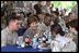 Laura Bush talks with military personnel during lunch at MacDill Air Force Base in Tampa, Fla., Wednesday, March 26, 2003. White House photo by Susan Sterner.