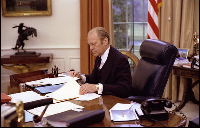 President Gerald R. Ford at work in the Oval Office at the White House, Jan. 27, 1976.