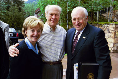 Former President Gerald R. Ford stands with Vice President Dick Cheney and Mrs. Lynne Cheney upon their arrival to Beaver Creek, Colorado for the American Enterprise Institute World Forum, June 20, 2003. President Ford, in partnership with British Prime Minister James Callaghan, French President Valery Giscard D'Estaing, and German Chancellor Helmut Schmidt, created the AEI World Forum to annually gather senior business executives, government officials, and world scholars for dialogue in international finance, trade, national security, social policy, and politics.