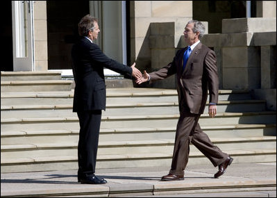 President George W. Bush is welcomed to Gleneagles Hotel in Auchterarder, Scotland, by Britain's Prime Minister Tony Blair Thursday, July 7, 2005, for the first G8 session.