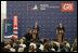 President George W. Bush and President Vladimir Putin of Russia, answer questions from reporters during a joint press availability at the International Media Center at the Konstantinovsky Palace Complex in Strelna, Russia, site of the 2006 G8 Summit.