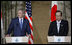 President George W. Bush and Japan's Prime Minister Yasuo Fukuda listen to questions from the audience during a joint press availability Sunday, July 6, 2008, at the Windsor Hotel Toya Resort and Spa. Japan is host to this year's 2008 Group of Eight Summit.