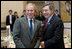 President George W. Bush and Prime Minister Gordon Brown of the United Kingdom, share a moment Tuesday, July 8, 2008, prior to the morning’s G-8 Working Session at the Windsor Hotel Toya Resort and Spa in Toyako, Japan.