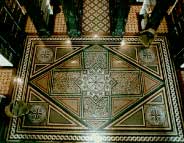 Photo showing the detail of the tile work on the Law Library floor (1985, White House)