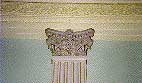 Photo showing the detail of a cast iron pilaster with moulding on the ceiling (1991, Office of Administration, EOP)