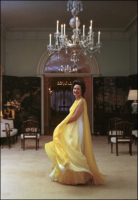 Former First Lady Lady Bird Johnson is seen in a evening gown in the White House, May 8, 1968. LBJ Library Photo by Robert Knudsen 