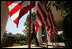 President George W. Bush walks to the podium in the Rose Garden before the start of a morning press availability Tuesday, May 31, 2005.