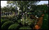 Visitors take photos of the Rose Garden Sunday, Oct. 19, 2008, during the annual Fall Garden Tour of the White House.