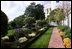 Varieties of Chrysanthemums, Salvia, Santolina and Asters bloom in the Rose Garden of the White House during the 2004 fall season.