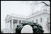 A small snowman is seen created on the north grounds of the White House Monday, Jan. 22, 2007, following a winter snowstorm that blanketed the Washington, D.C. area Sunday.