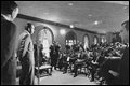 President Richard Nixon talks with reporters in the new Press Briefing Room April 17, 1970. The room was built over the site of Franklin Roosevelt's swimming pool.