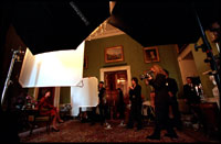 With the Green Room’s silk walls in the background, photographer Annie Liebowitz takes Laura Bush’s photograph March 20, 2001. In the 1890s, another notable woman photographer, Frances Benjamin Johnston, took photos of the White House interior.