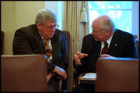 Vice President Cheney speaks with Speaker of the House Dennis Hastert in the Cabinet Room following a meeting about the military with members of Congress January 23, 2002.