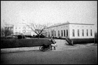 Roosevelt's temporary office building was built on the west side of the White House. This one-story structure housed the President's office, the Cabinet Room and other offices. Today this building is known as the West Wing.