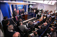 President George W. Bush and Mrs. Laura Bush participate in the ribbon-cutting ceremony to officially open the newly renovated James S. Brady Press Briefing Room Wednesday morning, July 11, 2007, at the White House.