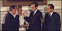 Appointed by then-President Richard Nixon, future President George H.W. Bush is sworn-in as U.S. Representative to the United Nations in the State Dining Room February 26, 1971.