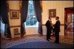 Before delivering his address to Congress and the nation following the attacks of September 11, President George W. Bush speaks with British Prime Minister Tony Blair in the Blue Room, Sept. 20, 2001. 