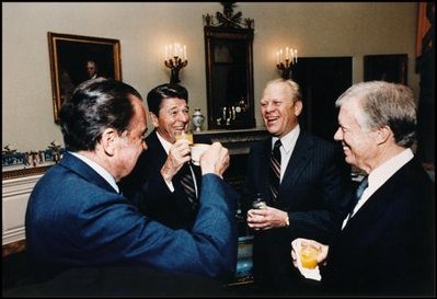 President Ronald Reagan hosts former Presidents Ford, Nixon and Carter as they share a laugh in the Blue Room October 8, 1981. Since the opening of the White House in 1800, presidents and first ladies have used the Blue Room to formally receive and greet guests.