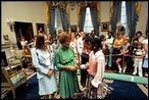 Rosalynn Carter greets young White House visitors in the Blue Room August 4, 1978.