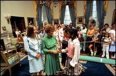 Rosalynn Carter greets young White House visitors in the Blue Room August 4, 1978.