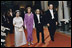 President Gerald Ford and Mrs. Ford escort Japanese Emperor Hirohito and Empress Nagako down the red carpet prior to a state dinner on October 2, 1975.