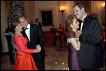 Leading their wives in the first dance of the evening, Presidents Bush and Mexican President Vicente Fox take to the floor during the state dinner held on September 5, 2001. 