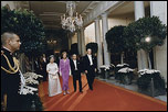 President Gerald Ford and Mrs. Ford escort Japanese Emperor Hirohito and Empress Nagako down the red carpet prior to a state dinner on October 2, 1975.